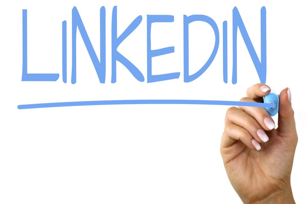 The word "LinkedIn" written with a blue marker 