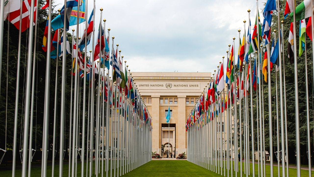 Row of flag poles in front of the United Nations building