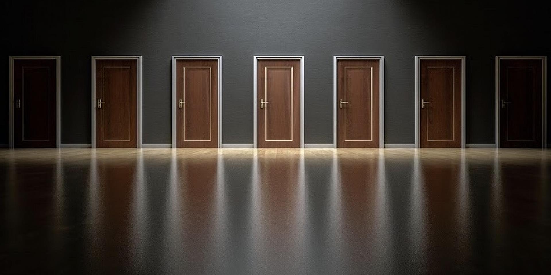 Multiple doors in a dark room