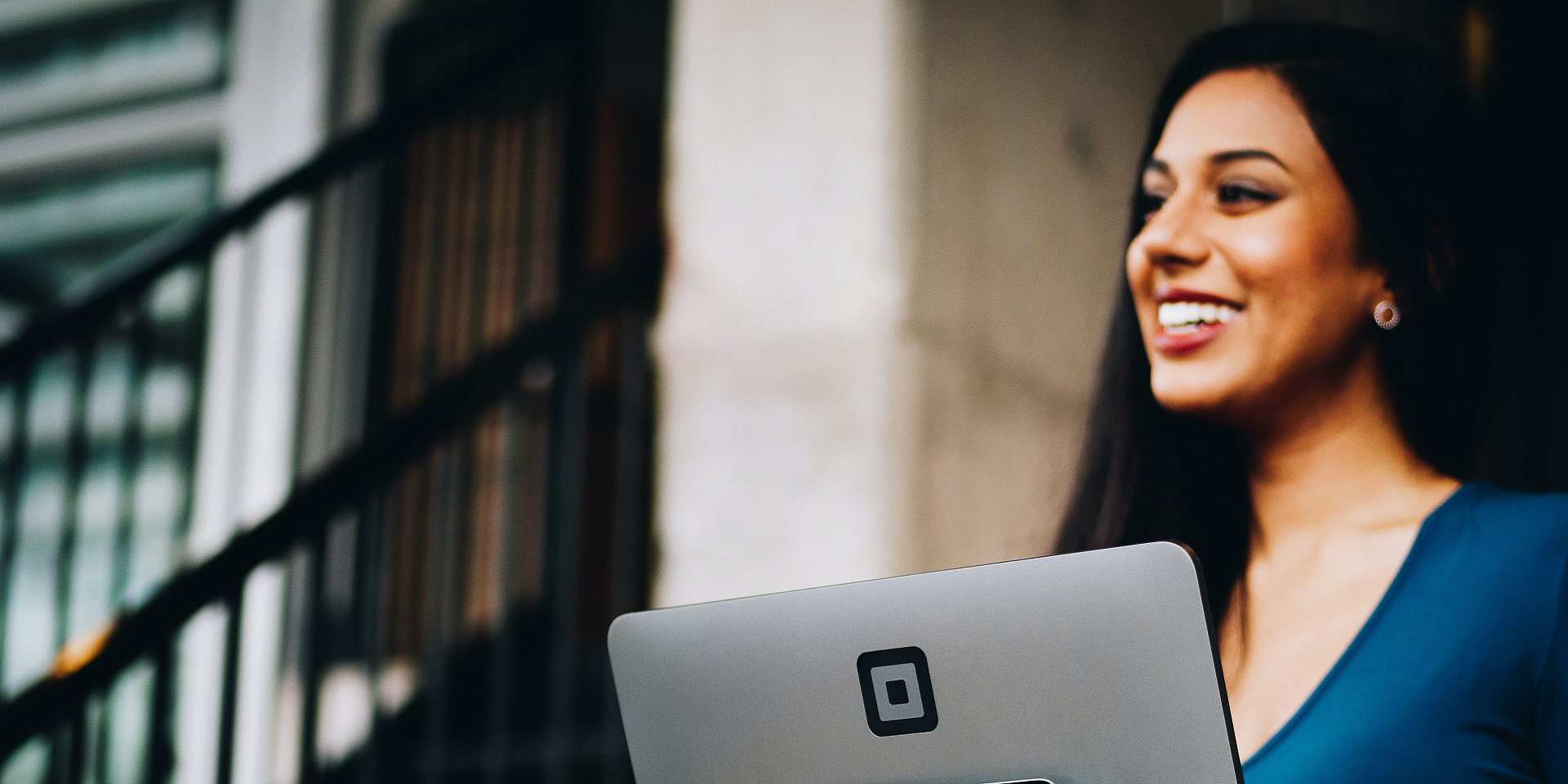 Women smiling in a virtual coffee chat