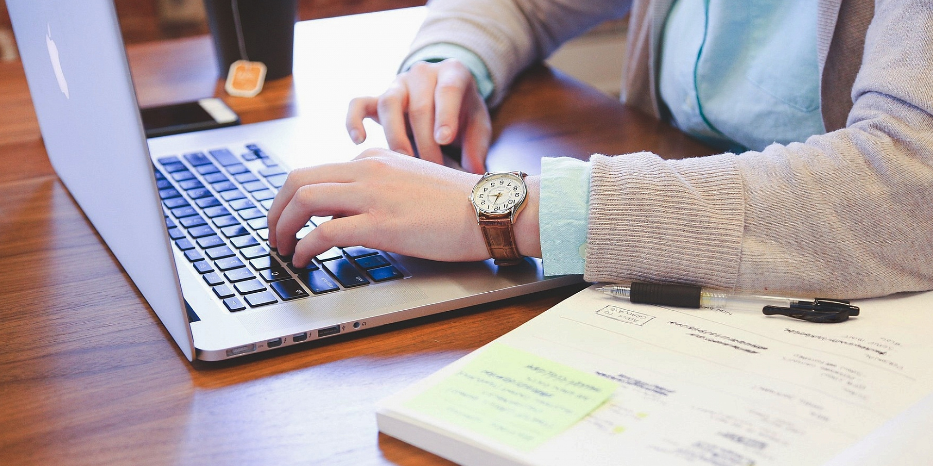 Student applying online on a laptop.