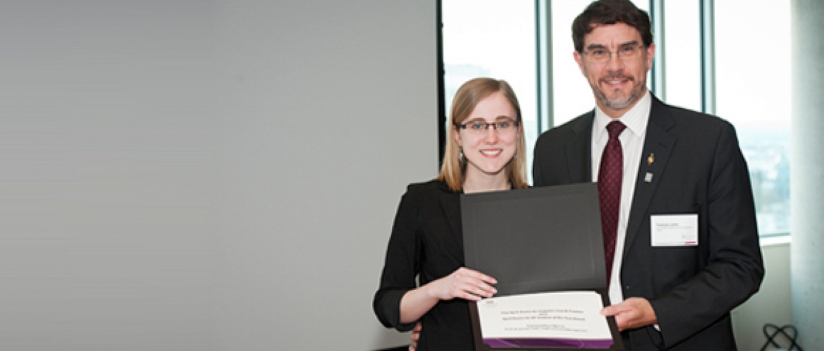Samantha Harris, with Dean François Julien, holding a certificate