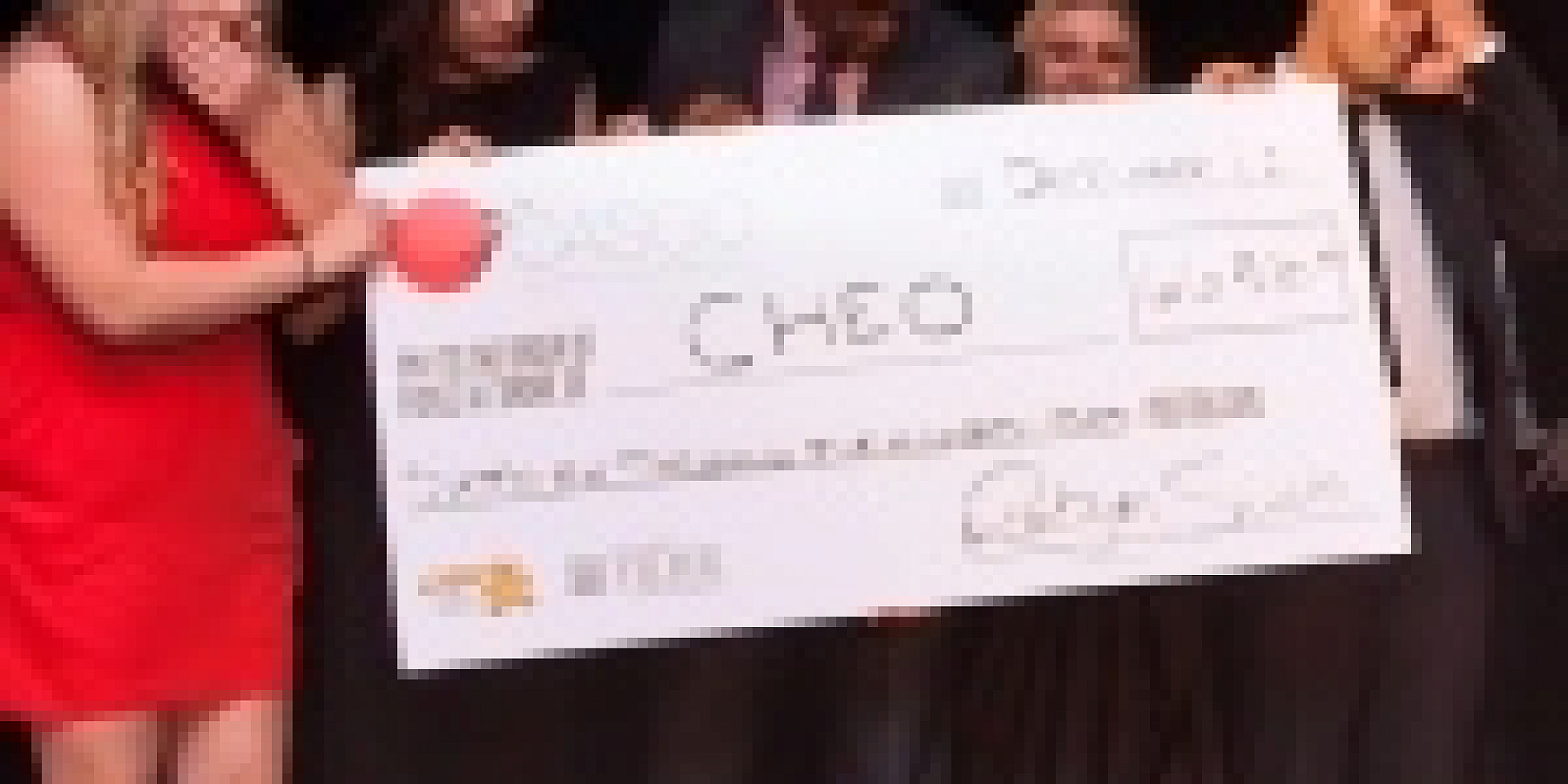 CASCO team presenting the big cheque