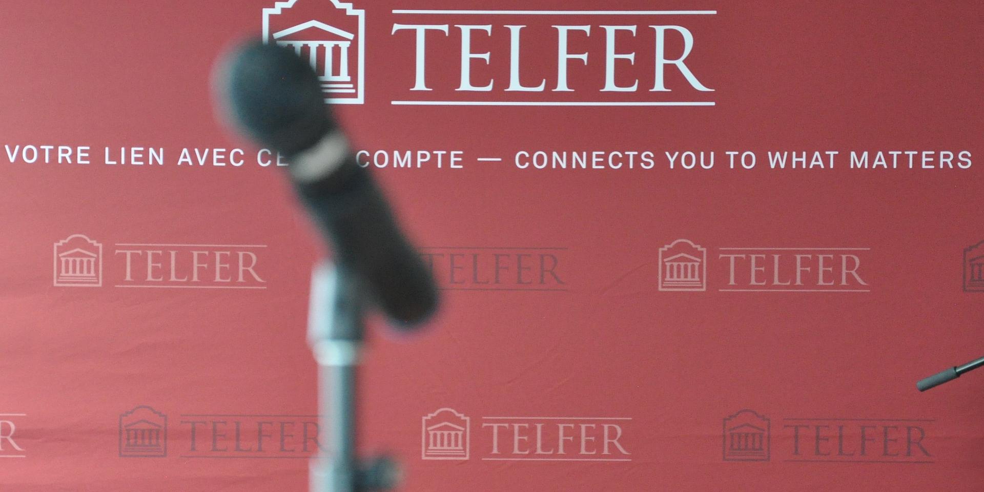 Microphone in front of a Telfer backdrop 