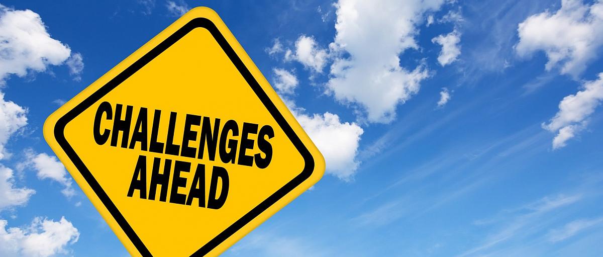 Challenges ahead sign