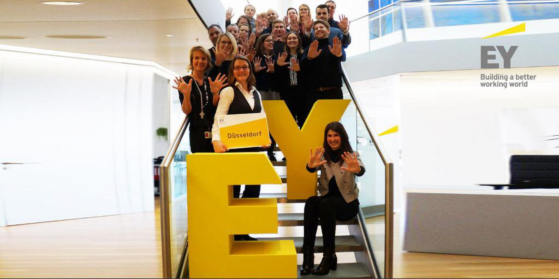 EY germany employees in stairs 