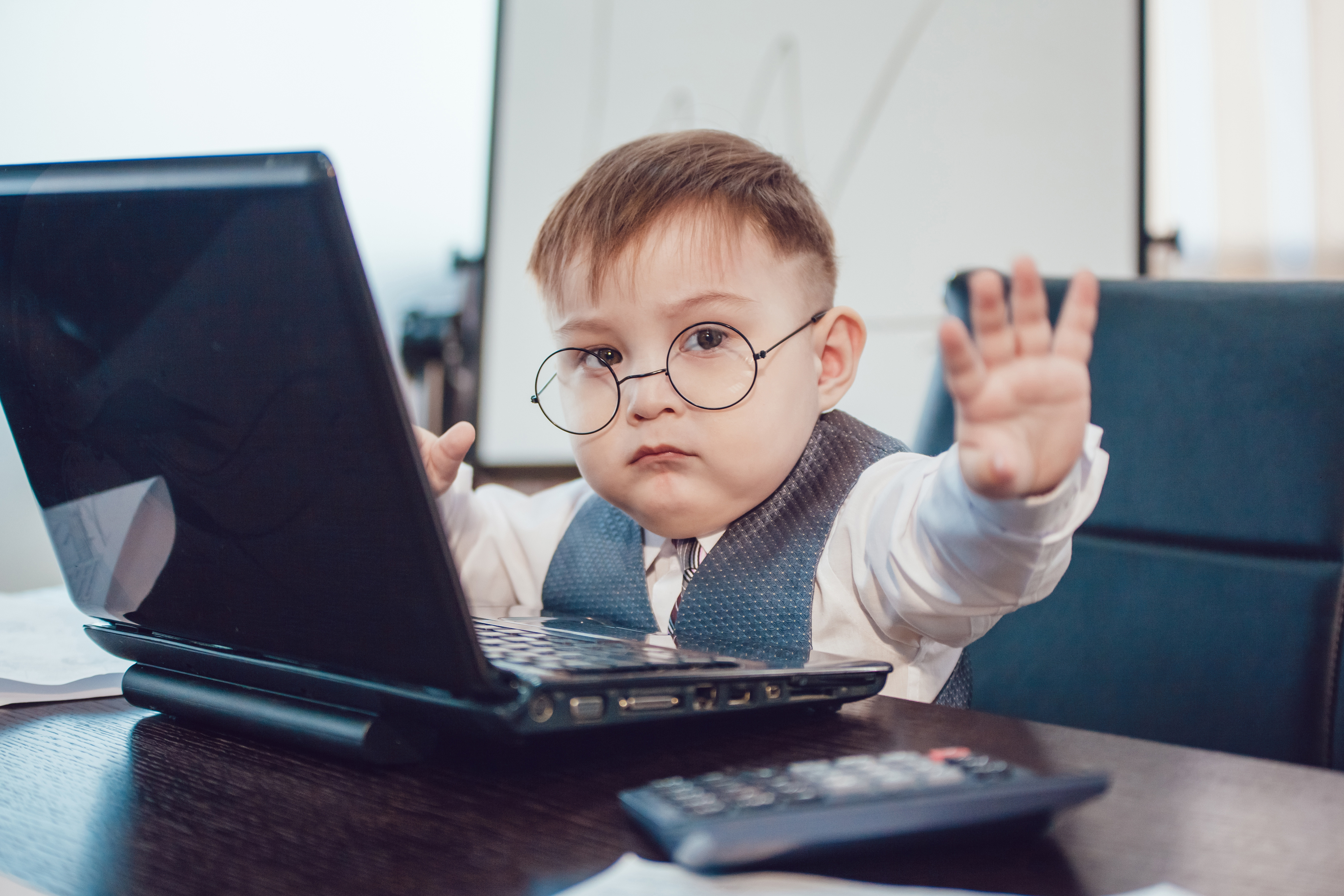 Baby boy working on computer