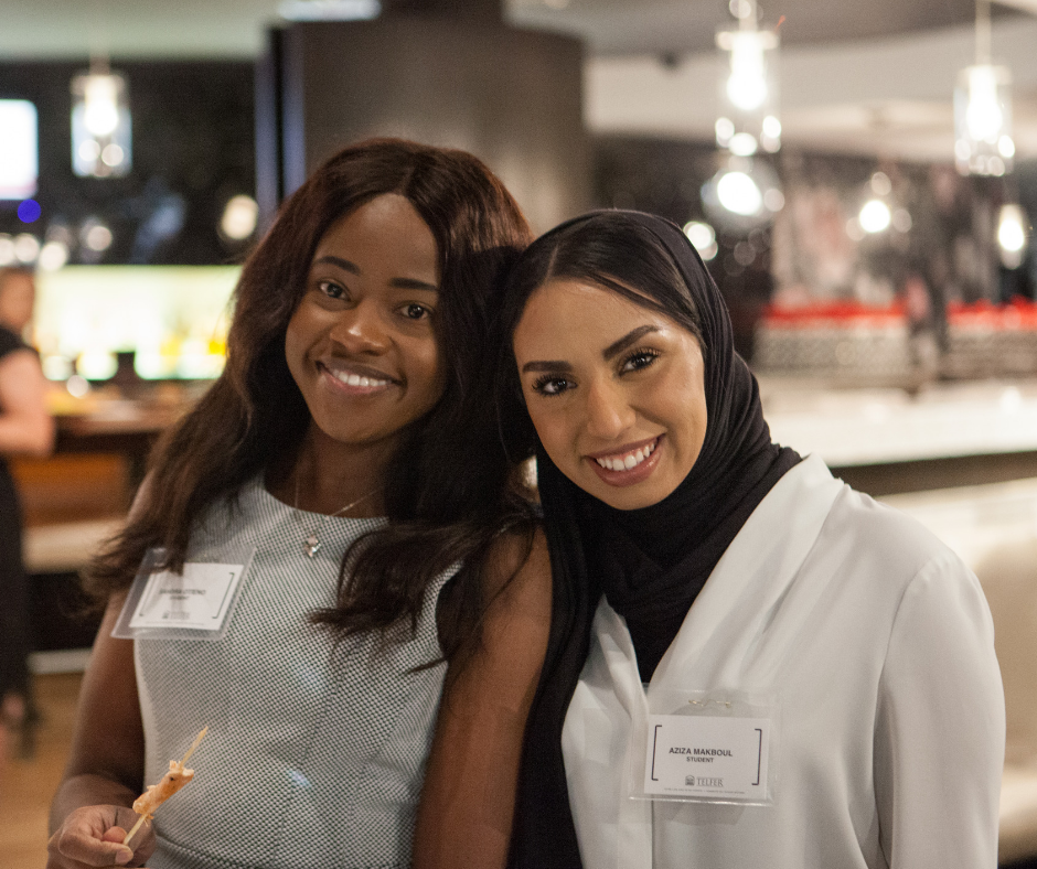 two girls smiling at mad marketing