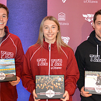 Three Telfer Gee-Gees Laughing while holding their awards