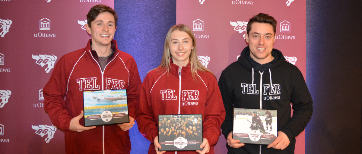 Three Telfer Gee-Gees Laughing while holding their awards