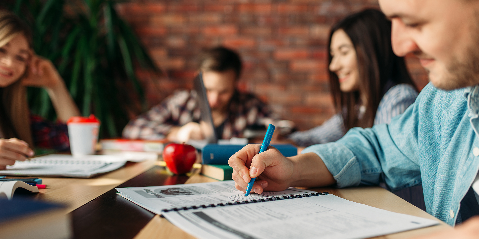 Group of students studying at a table