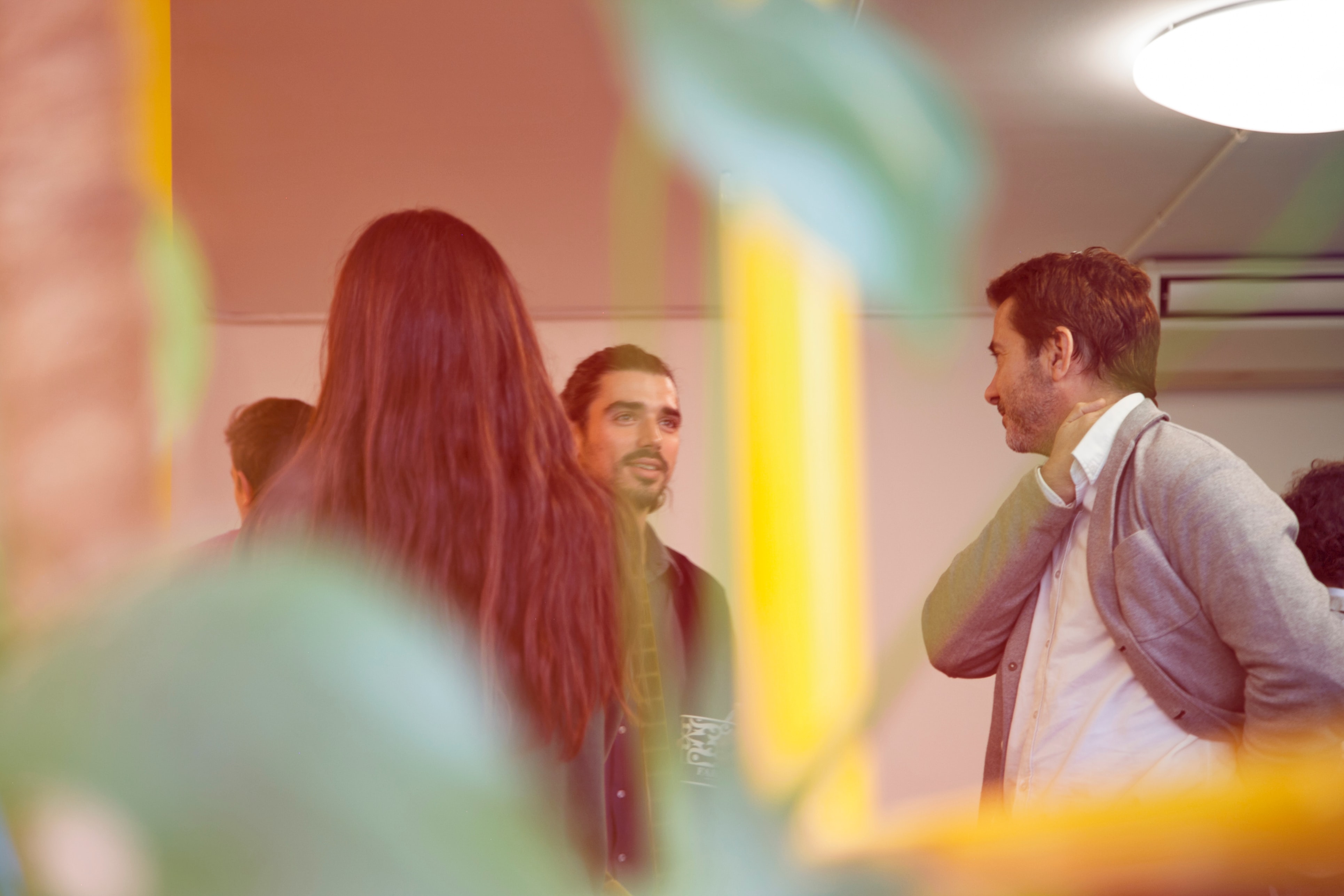 People talking at a networking event