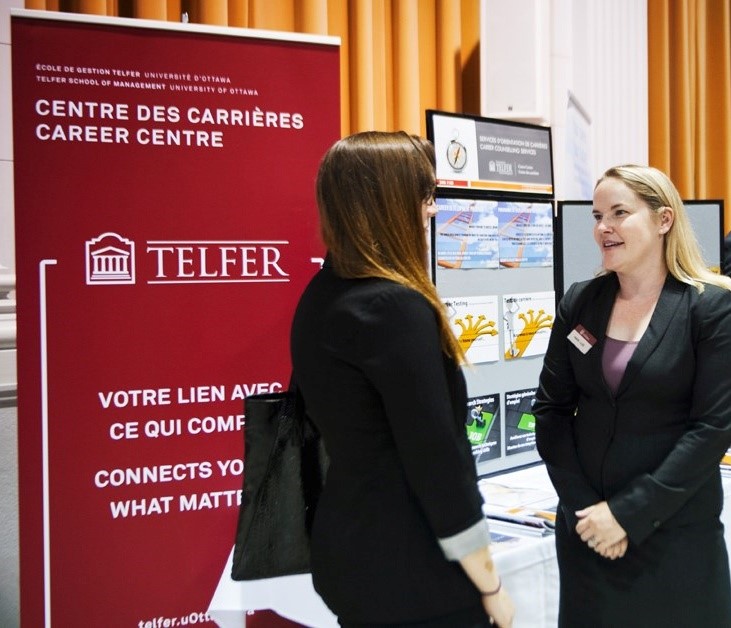 career centre representative and student talking