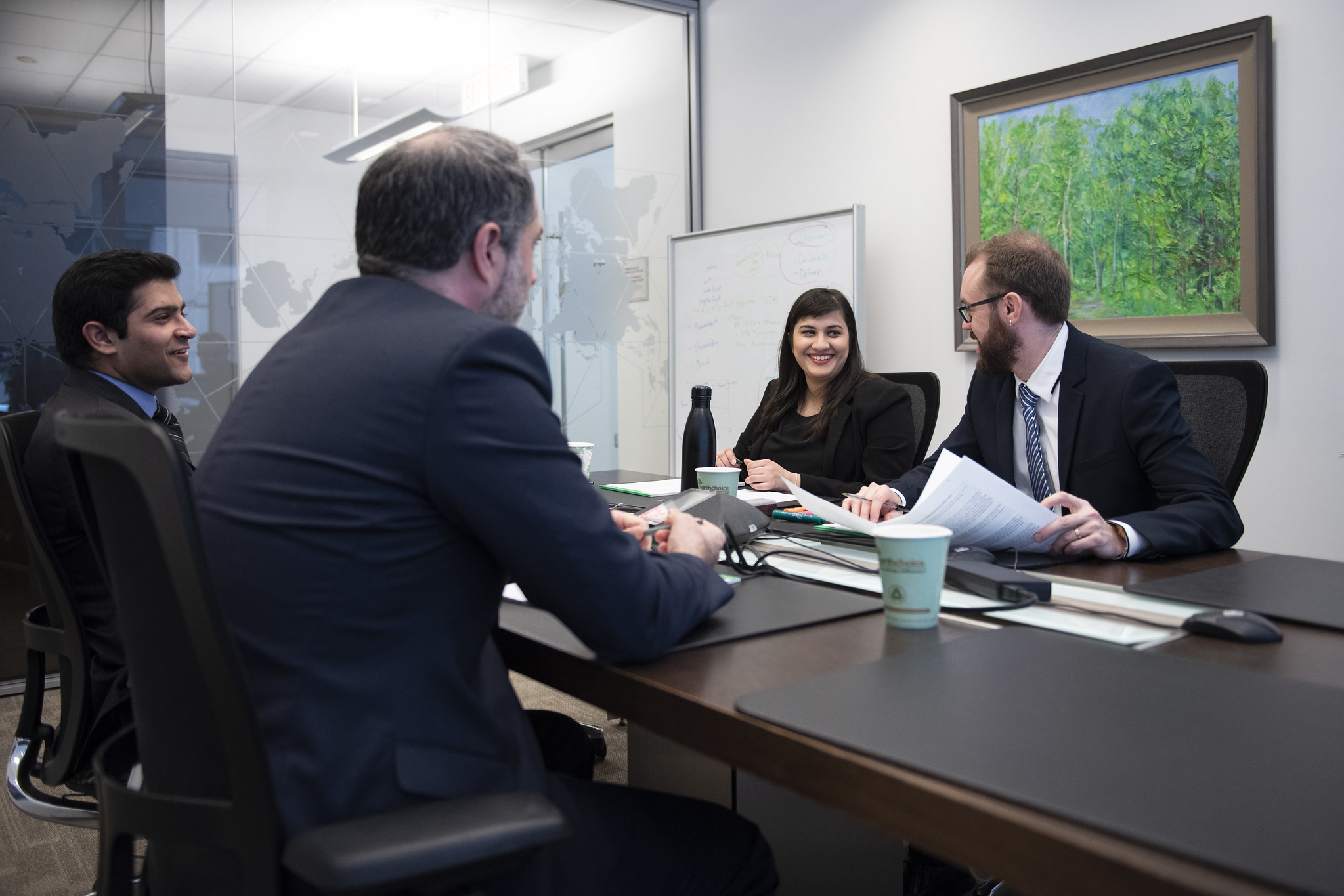 business people discussing around a conference table