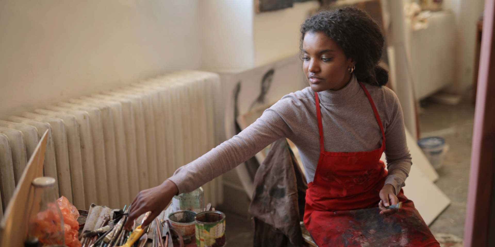 Artist working in her studio