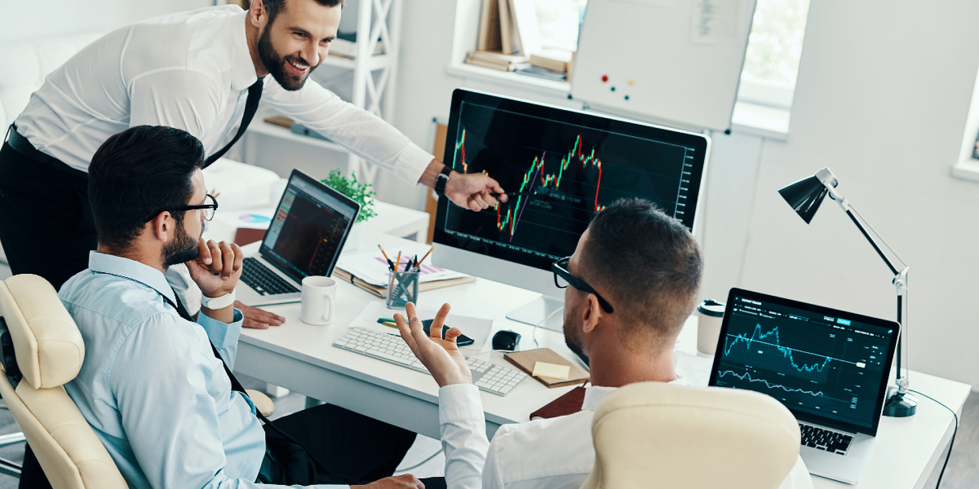 Men working together at a desk