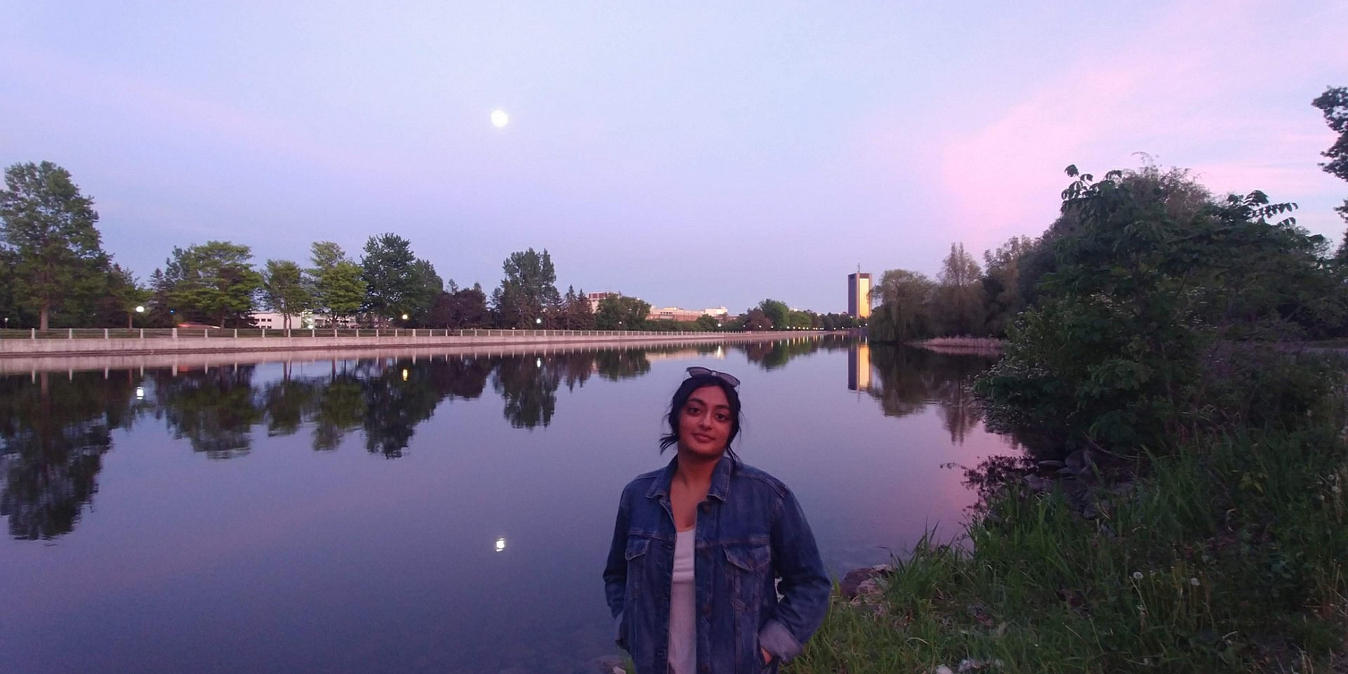 Bhanuja Rastogi in front of a canal.