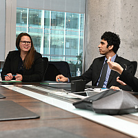 Young professionals discussing in a boardroom