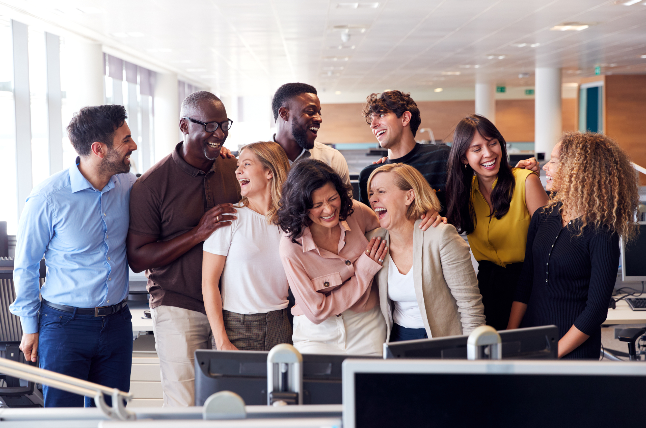 multiple employees having laughing and having fun