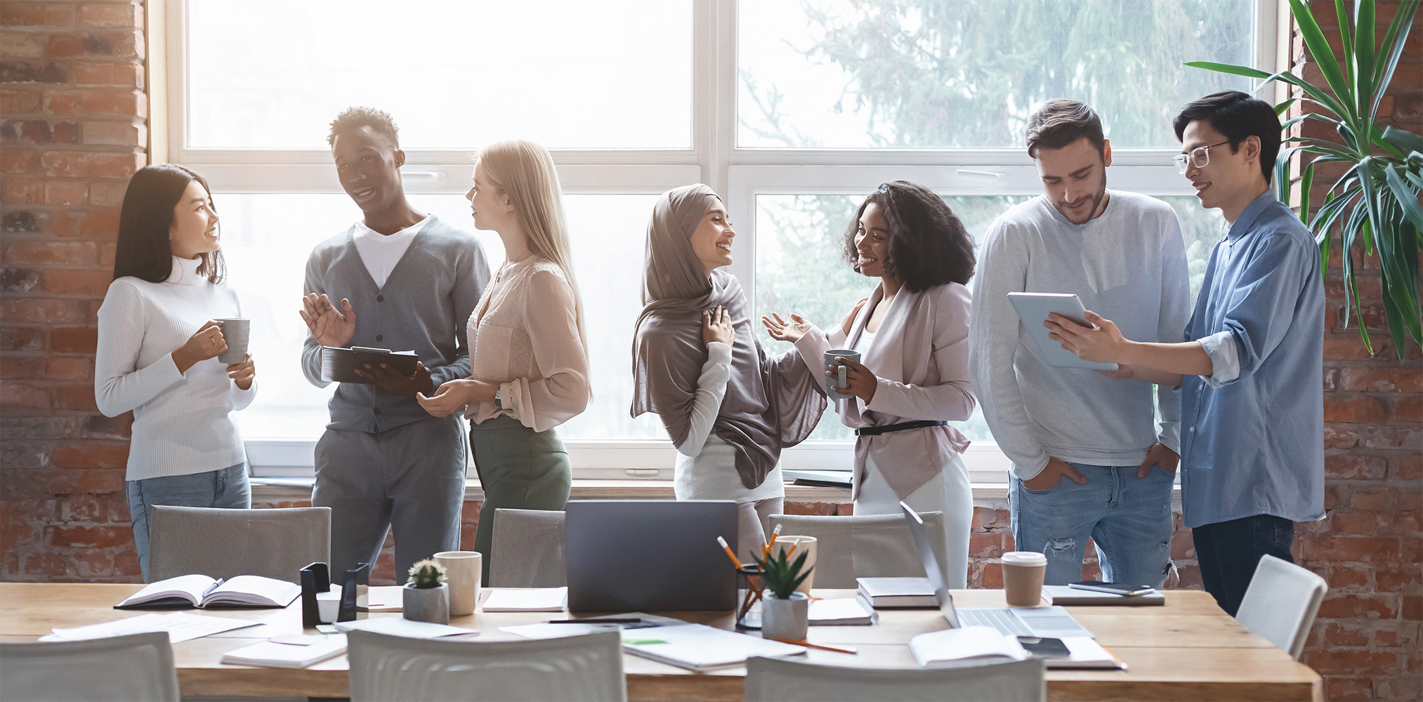 young happy people sharing ideas while coffe break stock photo