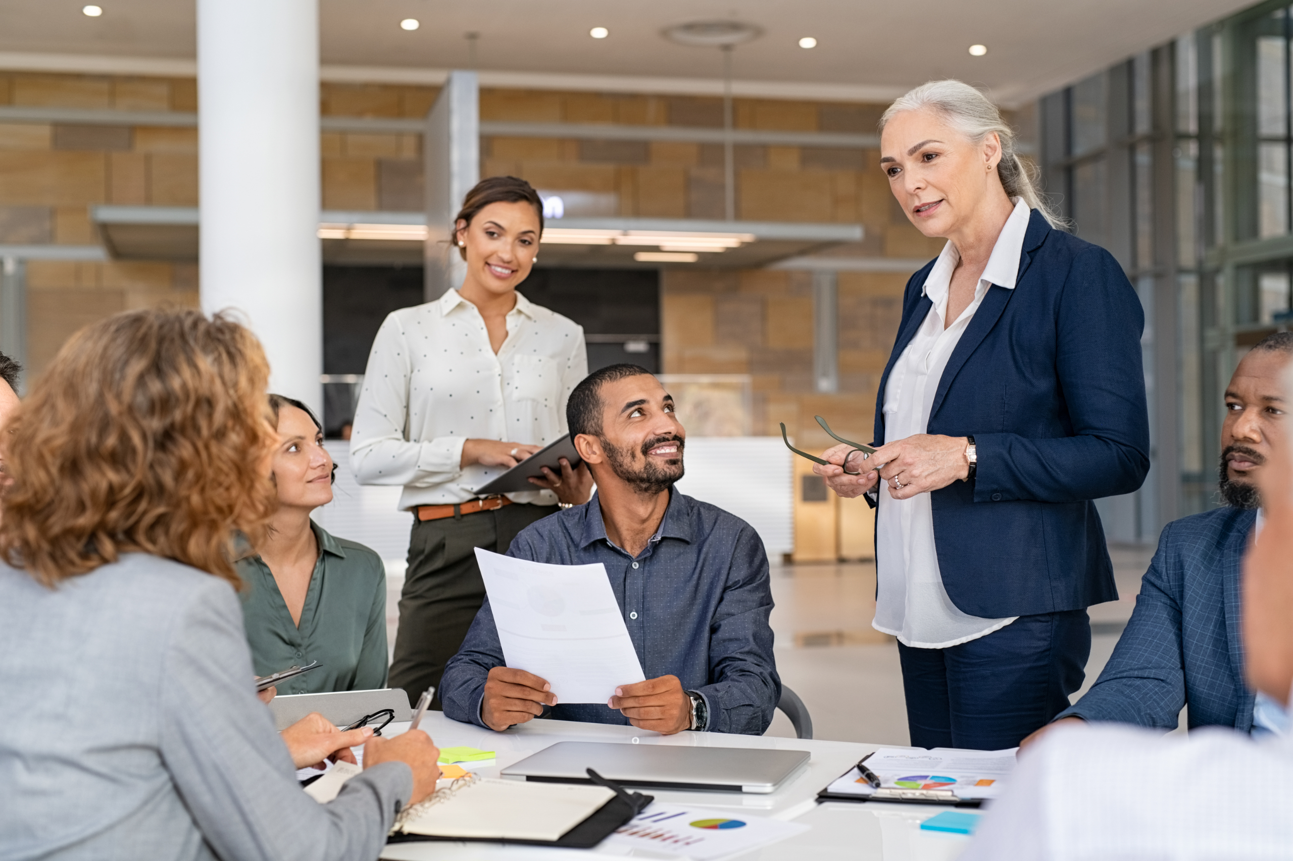 multiethnic-business-team-in-meeting-at-modern-boa