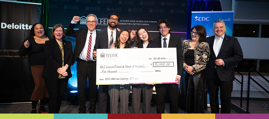 participants of the diversity and inclusion competition standing on the stage