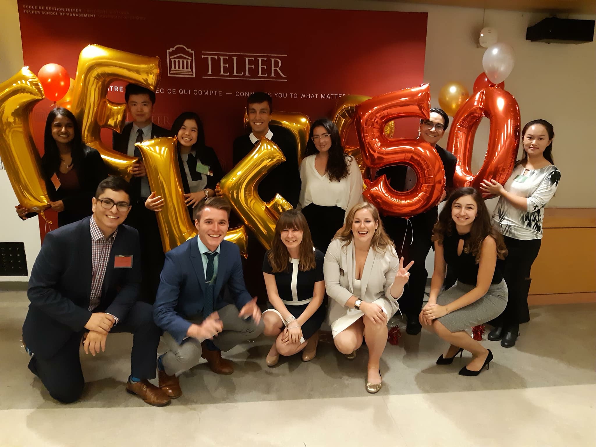 Telfer students celebrating Telfer's 50th anniversary with the Career Centre