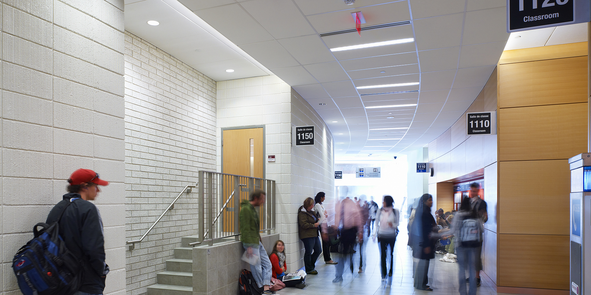 Telfer students waiting outside a classroom at Desmarais building