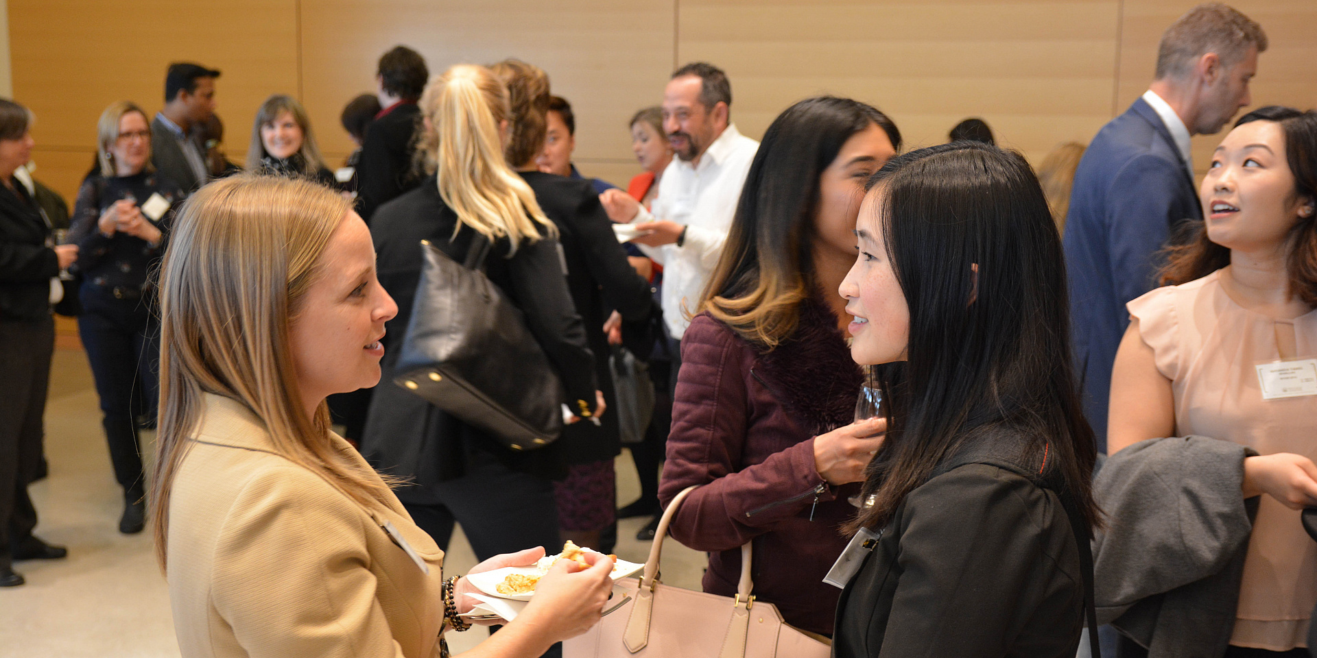 Student talking at a networking event