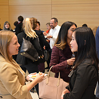 Student talking at a networking event