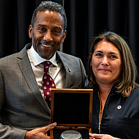 Anie Rouleau and Stéphane brutus holding the R. Trudeau Medal  