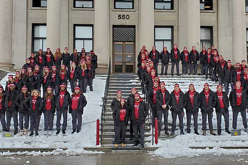 jdc group photo on building steps