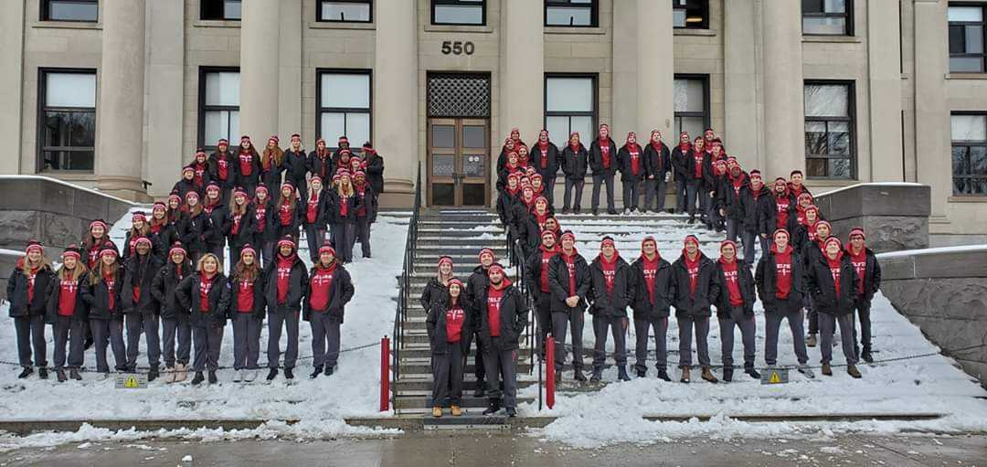 jdc group photo on building steps