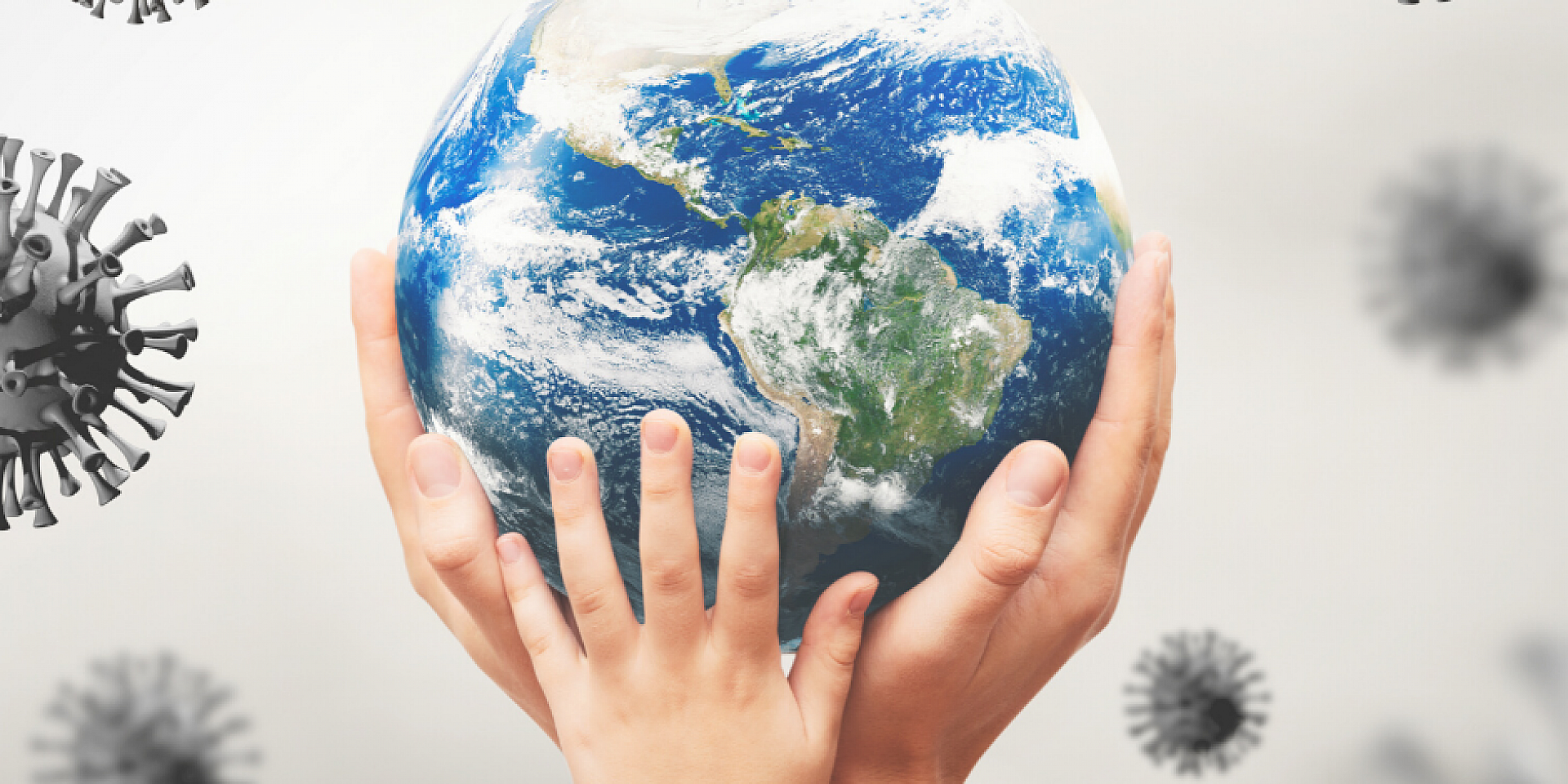 Hands holding a terrestrial globe