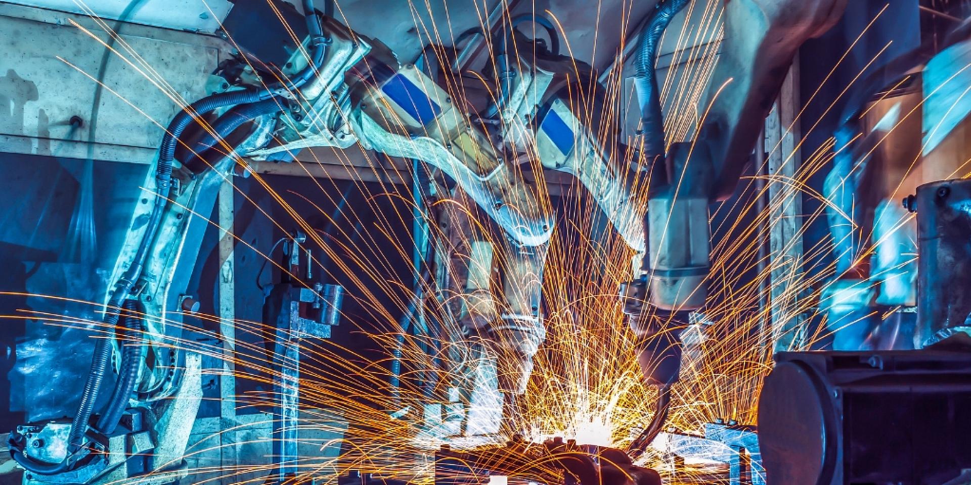 Sparks coming from a machine welding pieces of metal together