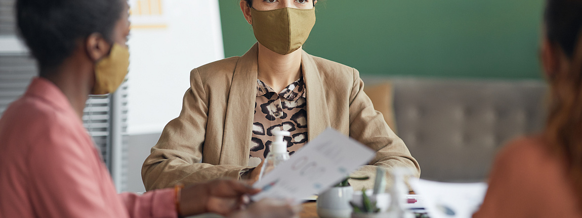 Business women wearing mask