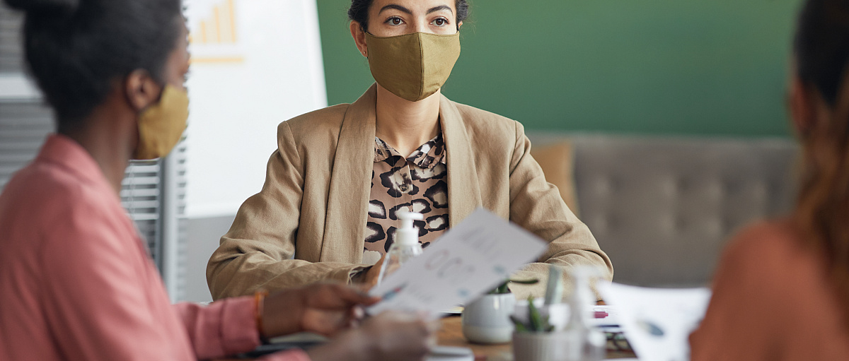 Business women wearing mask