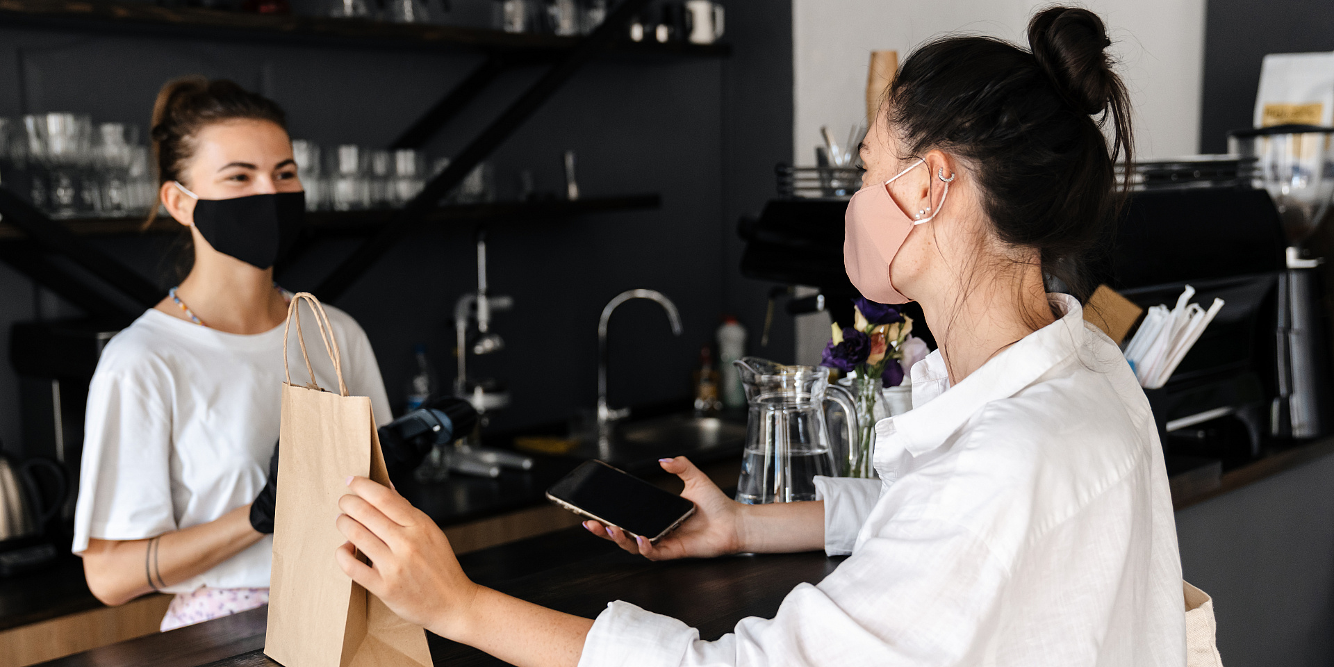 Customer bying at coffee shop