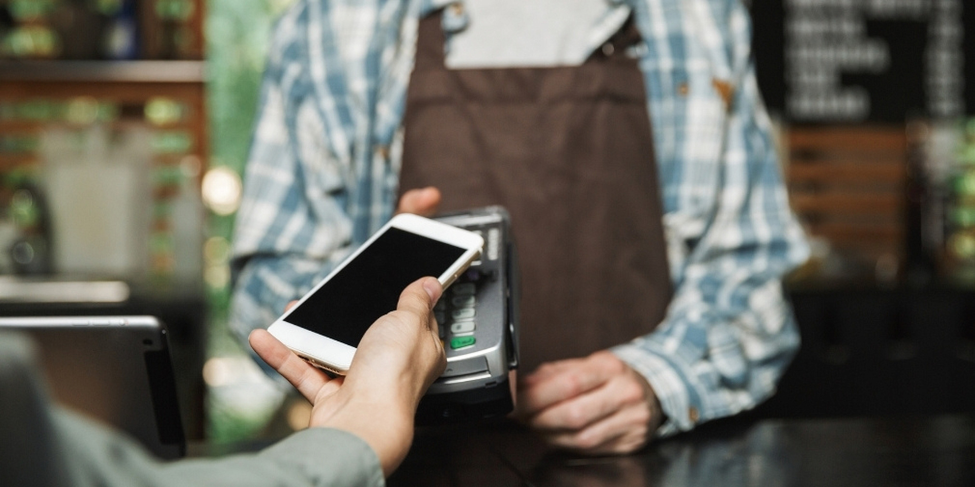 Client paying a bill at cashier