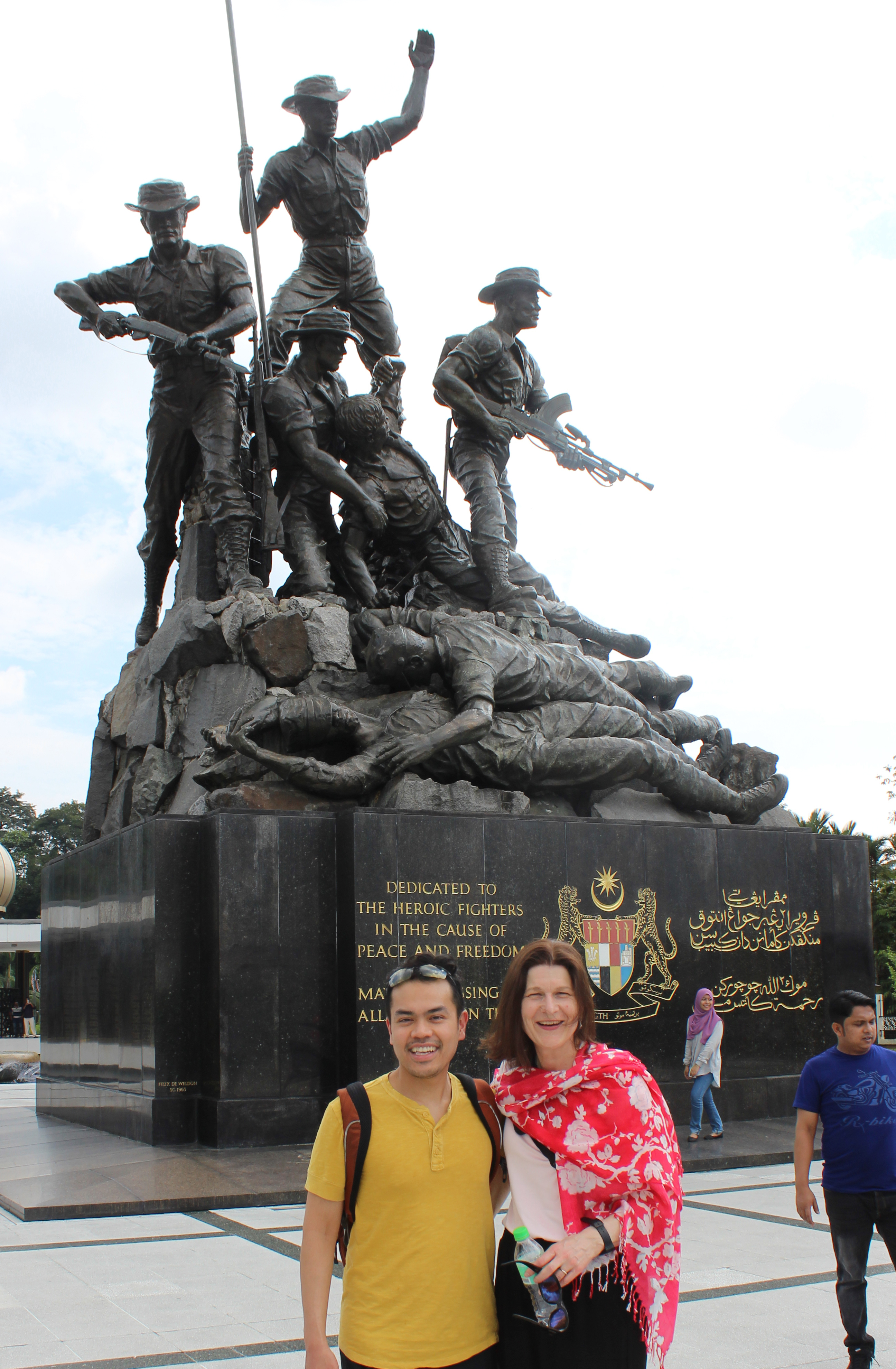 Professor Hyde and candidate in front of national monument in Kuala Lumpur
